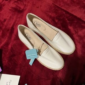 white flat shoes